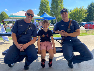 Three people on bench